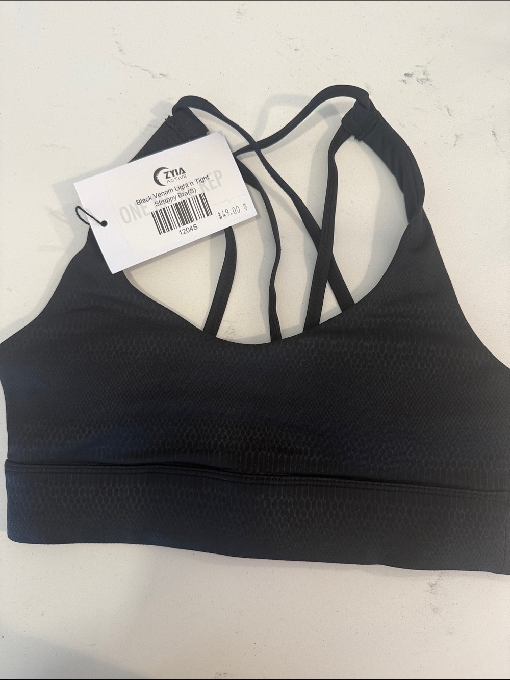 Black venom light and tight Strappy bra- s- NWT- retired